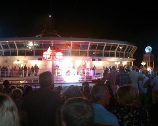 Dean Richardson as Freddie Mercury performing on the Azura sailaway party